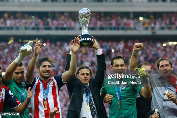 Matias Almeyda coach of Chivas lifts the champions trophy after winning the Final second leg match between Chivas and Tigres UANL as part of the...