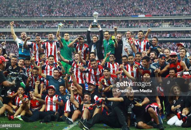 Matias Almeyda coach of Chivas lifts the champions trophy after winning the Final second leg match between Chivas and Tigres UANL as part of the...