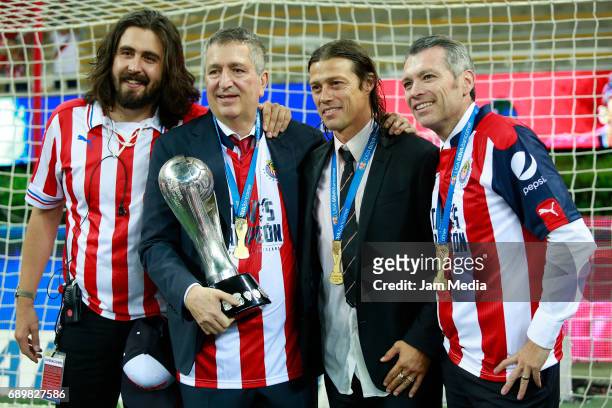 Amaury Vergara, Jorge Vergara, Matias Almeyda and Jose Luis Higuera pose with the champions trophy after winning the Final second leg match between...