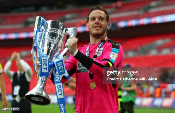 Danny Ward of Huddersfield Town celebrates with the trophy after the Sky Bet Championship Play Off Final match between Reading and Huddersfield Town...