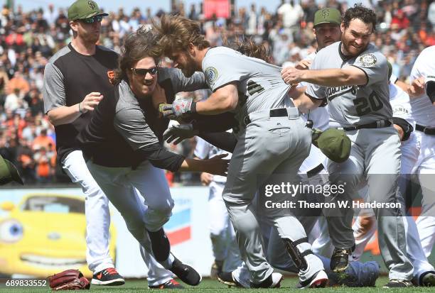 Jeff Samardzija of the San Francisco Giants goes after Bryce Harper of the Washington Nationals after Harper charged the mound from being hit by a...