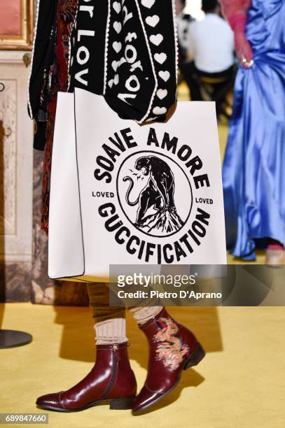 Model, bag detail, walks the runway at the Gucci Cruise 2018 show at Palazzo Pitti on May 29, 2017 in Florence, Italy.