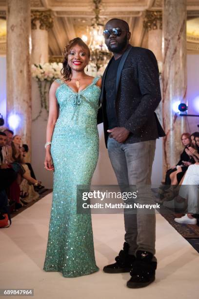 Maitre Gims and Producer/Designer Tiffany McCall Tiffany's Red Carpet Week Fashion Show at Carlton Hotel on May 23, 2017 in Cannes, France.