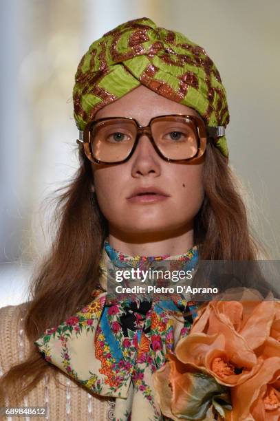 Model, beauty detail, walks the runway at the Gucci Cruise 2018 show at Palazzo Pitti on May 29, 2017 in Florence, Italy.