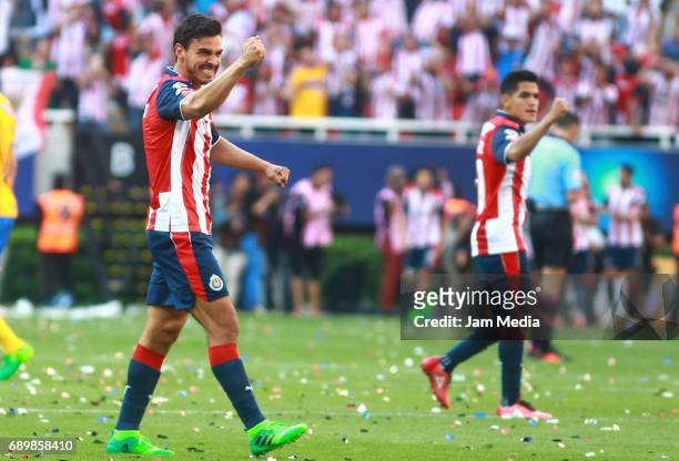 Oswaldo Alanis and Jesús Sánchez of Chivas celebrate after winning the Final second leg match between Chivas and Tigres UANL as part of the Torneo...