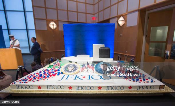 An 800 pound cake shaped like the John F. Kennedy Presidential Library at JFK100 Celebration on May 29, 2017 in Boston, Massachusetts. May 29th marks...
