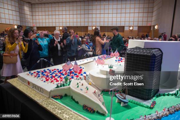 An 800 pound cake shaped like the John F. Kennedy Presidential Library at JFK100 Celebration on May 29, 2017 in Boston, Massachusetts. May 29th marks...