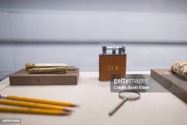 Various items owned by President John F. Kennedy on display at the JFK 100: Milestones & Mements Exhibit at the John F. Kennedy Presidential Library...