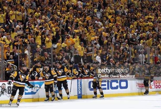 Nick Bonino and the Pittsburgh Penguins are congratulated by the bench after Bonino scored a goal in the first period of Game One of the 2017 NHL...