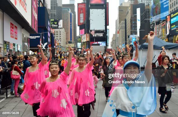 People from Japan and citizens of New York perform a traditional "Yosakoi" dance, originated in the western Japan prefecture of Kochi, in New York's...