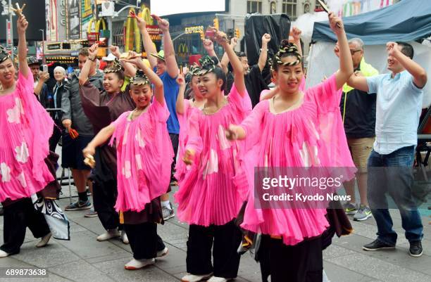 People from Japan and citizens of New York perform a traditional "Yosakoi" dance, originated in the western Japan prefecture of Kochi, in New York's...