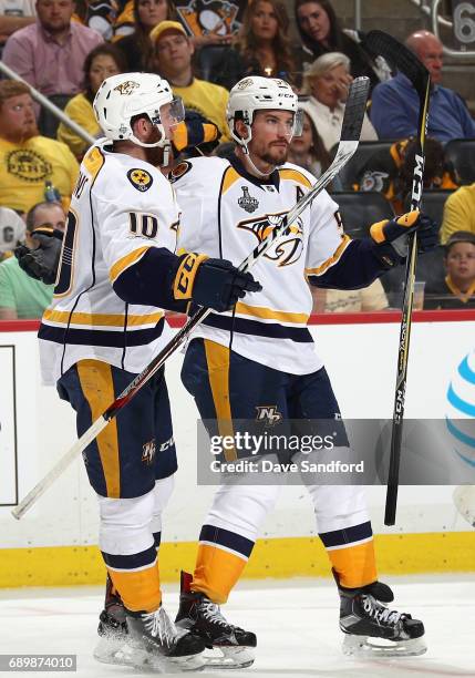 Colton Sissons of the Nashville Predators celebrates his goal with teammate Roman Josi during the third period of Game One of the 2017 NHL Stanley...