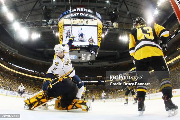 Nashville Predators center Filip Forsberg trips over Pittsburgh Penguins goalie Matt Murray during the third period in Game One of the 2017 NHL...