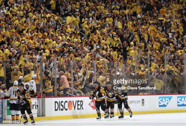 The crowd cheers after Jake Guentzel of the Pittsburgh Penguins scored the game-winning goal against the Nashville Predators during the third period...