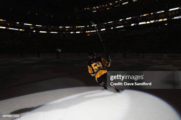 Jake Guentzel of the Pittsburgh Penguins acknowledges the crowd after being named first star by scoring the game winning goal to defeat the Nashville...