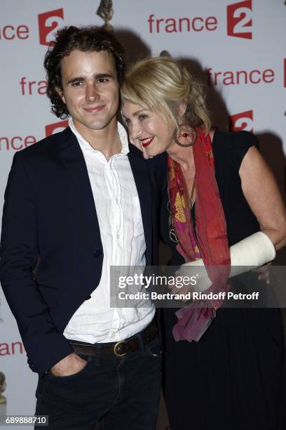 Maxime Coggio and his mother Fanny Cottencon attend "La Nuit des Molieres 2017" at Folies Bergeres on May 29, 2017 in Paris, France.