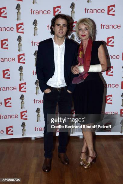 Maxime Coggio and his mother Fanny Cottencon attend "La Nuit des Molieres 2017" at Folies Bergeres on May 29, 2017 in Paris, France.