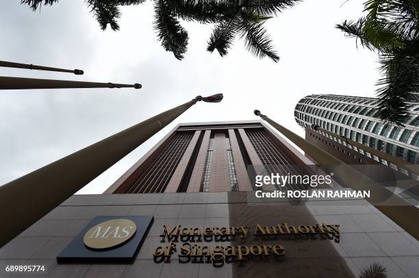 The Monetary Authority of Singapore building is seen in Singapore on May 30, 2017. - Singapore said May 30 it had fined Credit Suisse and a local...