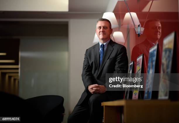 James Bullard, president and chief executive officer at the Federal Reserve Bank of St. Louis, poses for a photograph in Tokyo, Japan, on Tuesday,...