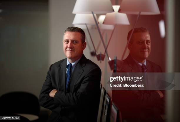 James Bullard, president and chief executive officer at the Federal Reserve Bank of St. Louis, poses for a photograph in Tokyo, Japan, on Tuesday,...