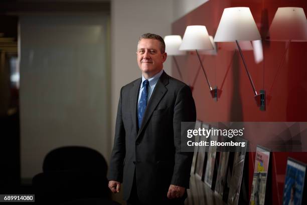 James Bullard, president and chief executive officer at the Federal Reserve Bank of St. Louis, poses for a photograph in Tokyo, Japan, on Tuesday,...