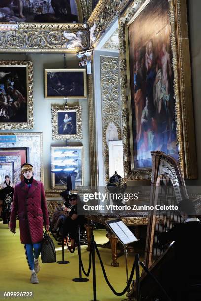 Model walks the runway at the Gucci Cruise 2018 show at Palazzo Pitti on May 29, 2017 in Florence, Italy.