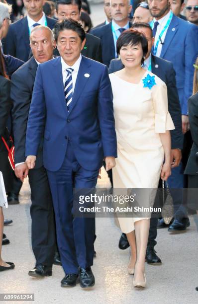 Japanese Prime Minister Shinzo Abe and his wife Akie arrive at the Teatro Greco for a concert during the first day of the G7 Summit on May 26, 2017...
