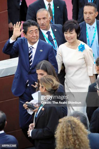 Japanese Prime Minister Shinzo Abe and his wife Akie arrive at the Teatro Greco for a concert during the first day of the G7 Summit on May 26, 2017...