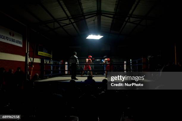 An evening of amateur boxing at the Prat-Lautaro Gymnasium Rahue, in Osorno, Chile, on May 29, 2017.