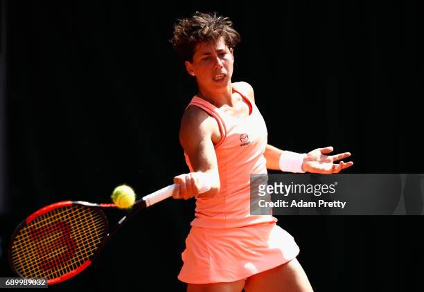 Carla Suarez Navarro of Spain plays a forehand during the ladies singles first round match against Maria Sakkari of Greece on day three of the 2017...