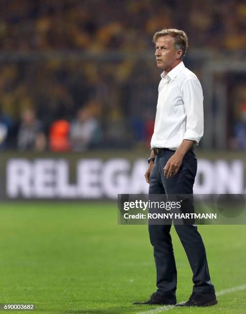 Wolfsburg's Dutch head coach Andries Jonker is pictured during German Bundesliga relegation second leg football match between Eintracht Braunschweig...