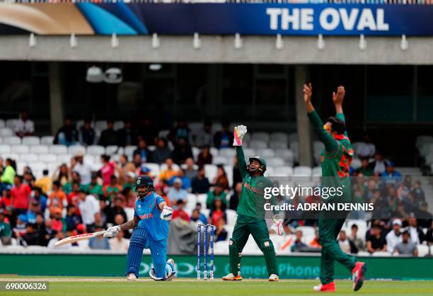 Bangladesh's Soumya Sarkar unsuccessfully appeals for lbw of India's Shikhar Dhawan , off the bowling of Bangladesh's Mehedi Hasan Miraz during the...