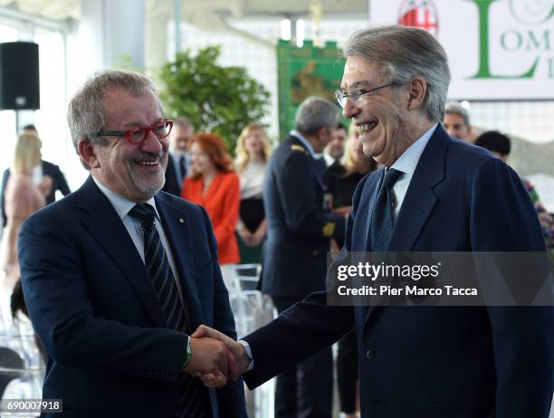 Roberto Maroni Governor of Lombardia Region and Massimo Moratti attend Rosa Camuna awards at Palazzo Lombardia on May 30, 2017 in Milan, Italy.