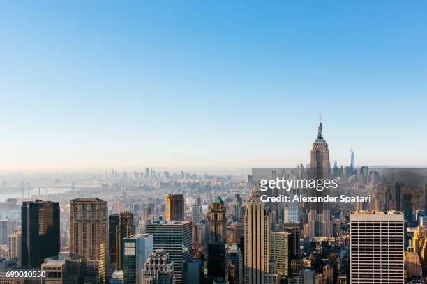 new york city cityscape in the morning with clear blue sky - aerial view of mid town manhattan new york bildbanksfoton och bilder