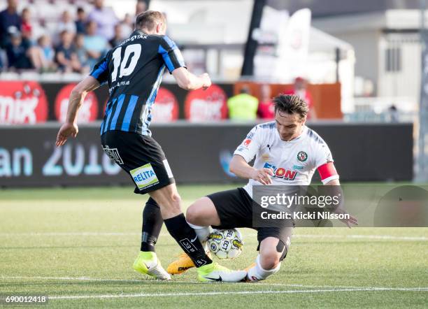 Dragan Kapcevic of IK Sirius FK, Nordin Gerzic of Orebro SK during the Allsvenskan match between Orebro SK and IK Sirius FK at Behrn Arena on May 29,...