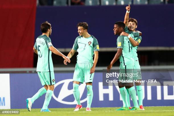 Xadas of Portugal celebrates with Yuri Ribeiro, Diogo Goncalves and Xande Silva after scoring a goal during the FIFA U-20 World Cup Korea Republic...