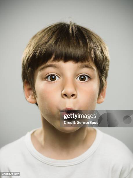 cute little boy whistling - beicinho imagens e fotografias de stock