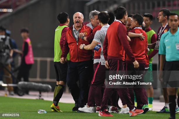 Felipe Scolari head coach of Guangzhou Evergrande celabrates after winning the match against Kashima Antlers during the AFC Champions League Round of...
