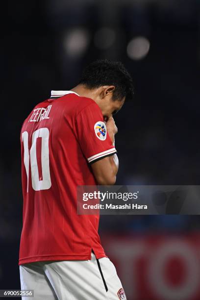 Teerasil Dangda of Muangthong United looks on during the AFC Champions League Round of 16 match between Kawasaki Frontale and Muangthong United at...