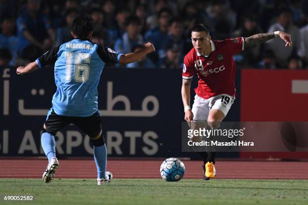 Traistan Do of Muangthong United in action during the AFC Champions League Round of 16 match between Kawasaki Frontale and Muangthong United at...