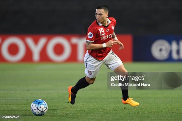 Traistan Do of Muangthong United in action during the AFC Champions League Round of 16 match between Kawasaki Frontale and Muangthong United at...