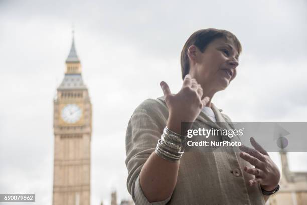 Green Party co-leader Caroline Lucas speaks next to a green question mark at Parliament Square, London on May 30 during a general election campaign...