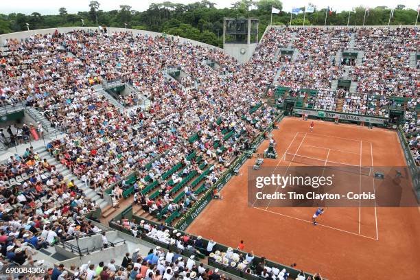 French Open Tennis Tournament - Day Two. Rafael Nadal of Spain in action against Benoit Paire of France on Court Suzanne-Lenglen during the Men's...