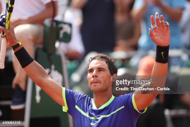 French Open Tennis Tournament - Day Two. Rafael Nadal of Spain celebrates his victory against Benoit Paire of France on Court Suzanne-Lenglen during...