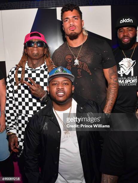 Mack Maine, Lil Wayne and Duke Riley attend Duke Rileys signing party at Gold Room on May 27, 2017 in Atlanta, Georgia.