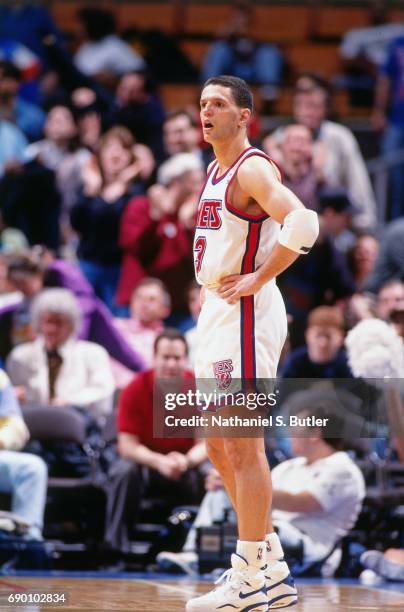 Drazen Petrovic of the New Jersey Nets looks on during the game circa 1993 at the Brendan Byrne Arena in East Rutherford, New Jersey. NOTE TO USER:...
