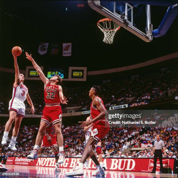Drazen Petrovic of the New Jersey Nets shoots the ball during the game against the Chicago Bulls circa 1993 at the Brendan Byrne Arena in East...