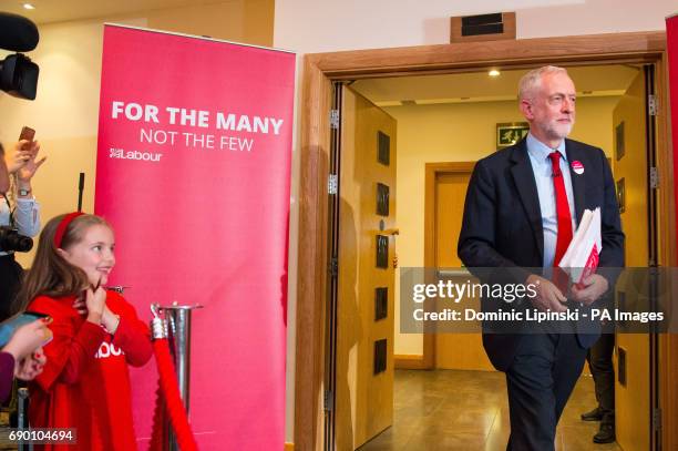 Czarina watches as Labour leader Jeremy Corbyn arrives to launch the party's race and faith manifesto at an event in Watford.