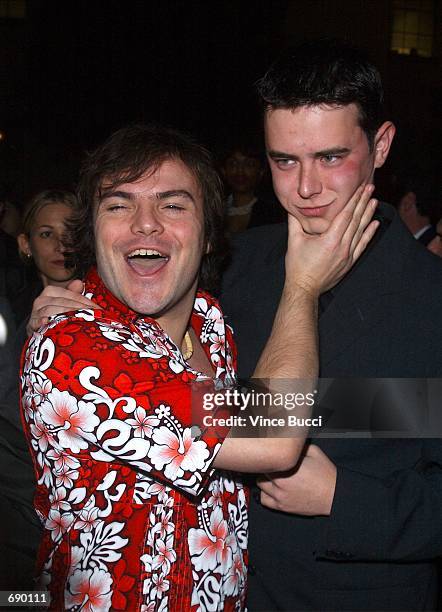 Actors Jack Black and Colin Hanks attend the premiere of the film Orange County January 7, 2002 at the Paramount Pictures studio theatre in...