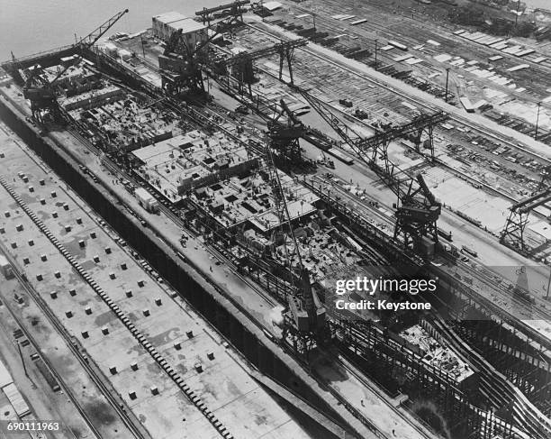 Aerial view of the world's first nuclear-powered aircraft carrier the USS Enterprise of the United States Navy under construction at the Newport News...